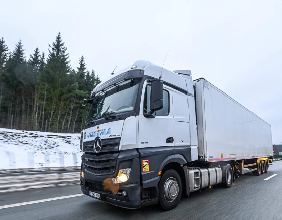 International road freight transport with covered semi-trailer in Europe